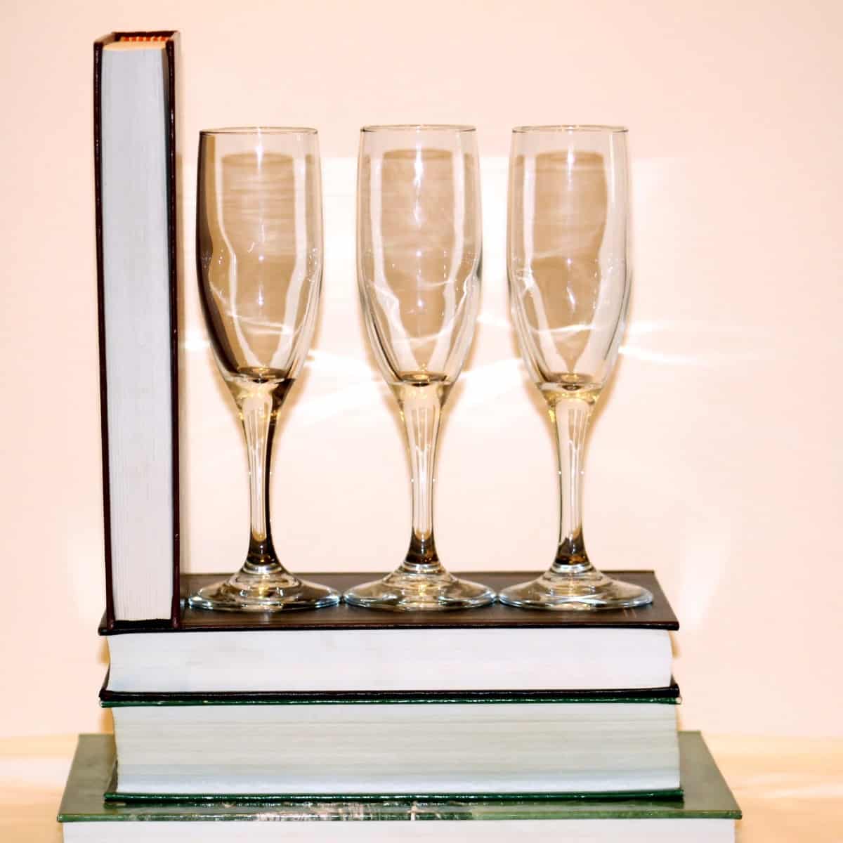 books and champagne glasses.