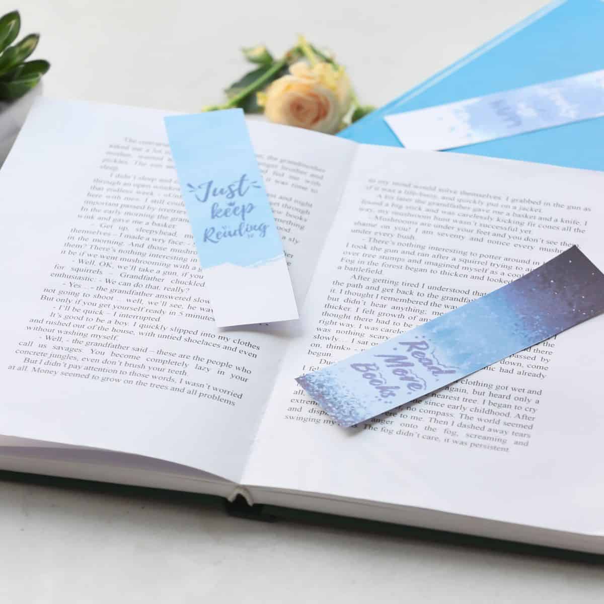 bookmarks with quotes and a book.