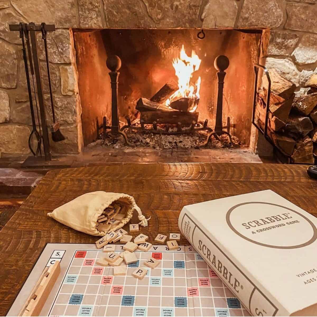 playing scrabble by the fireplace.