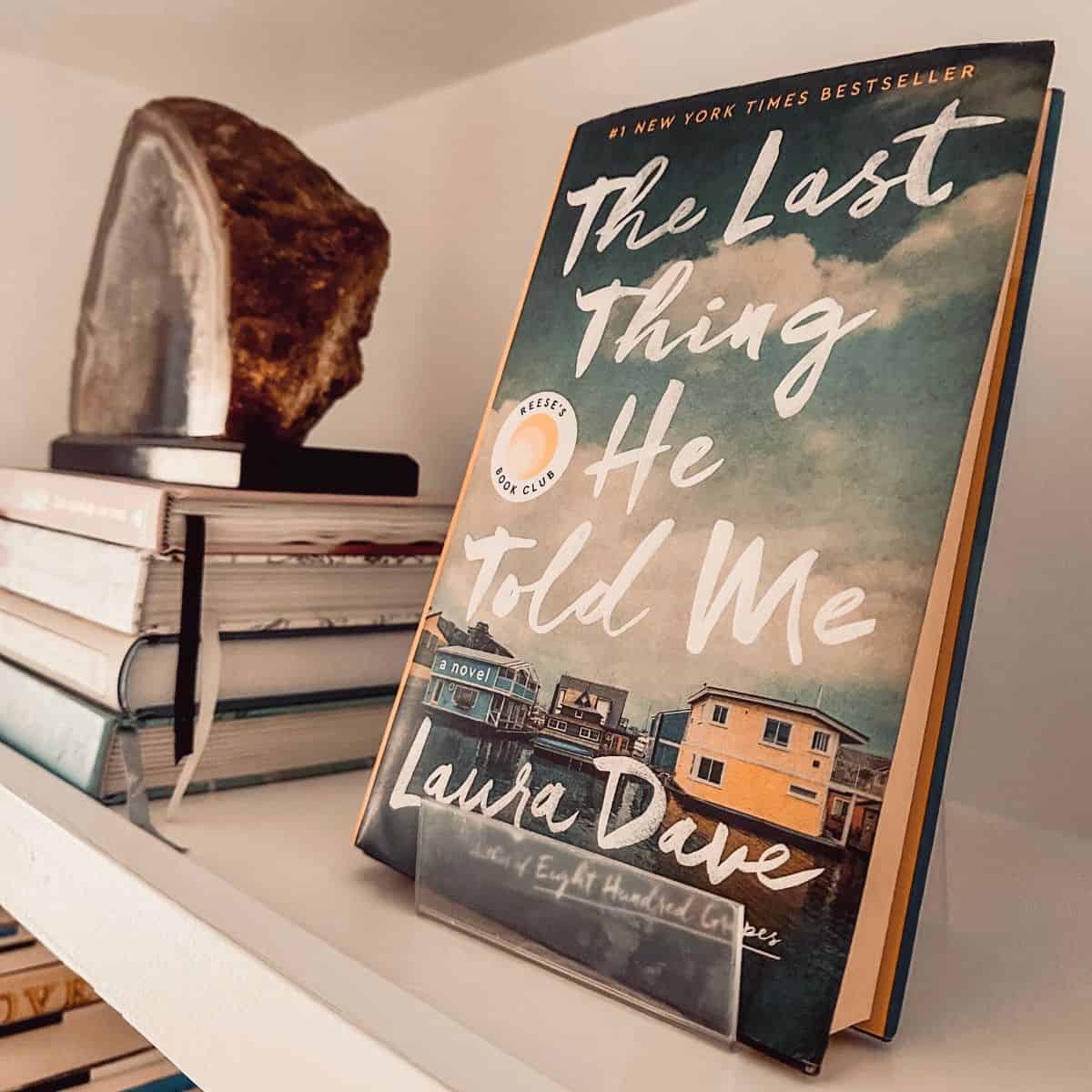 the last thing he told me by laura dave displayed on a bookshelf.