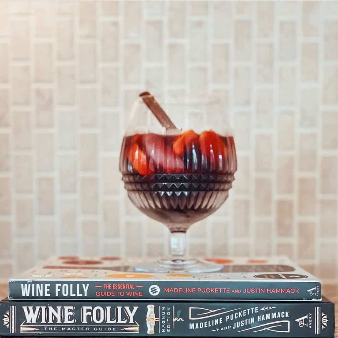 wine books with glass of sangria on top.