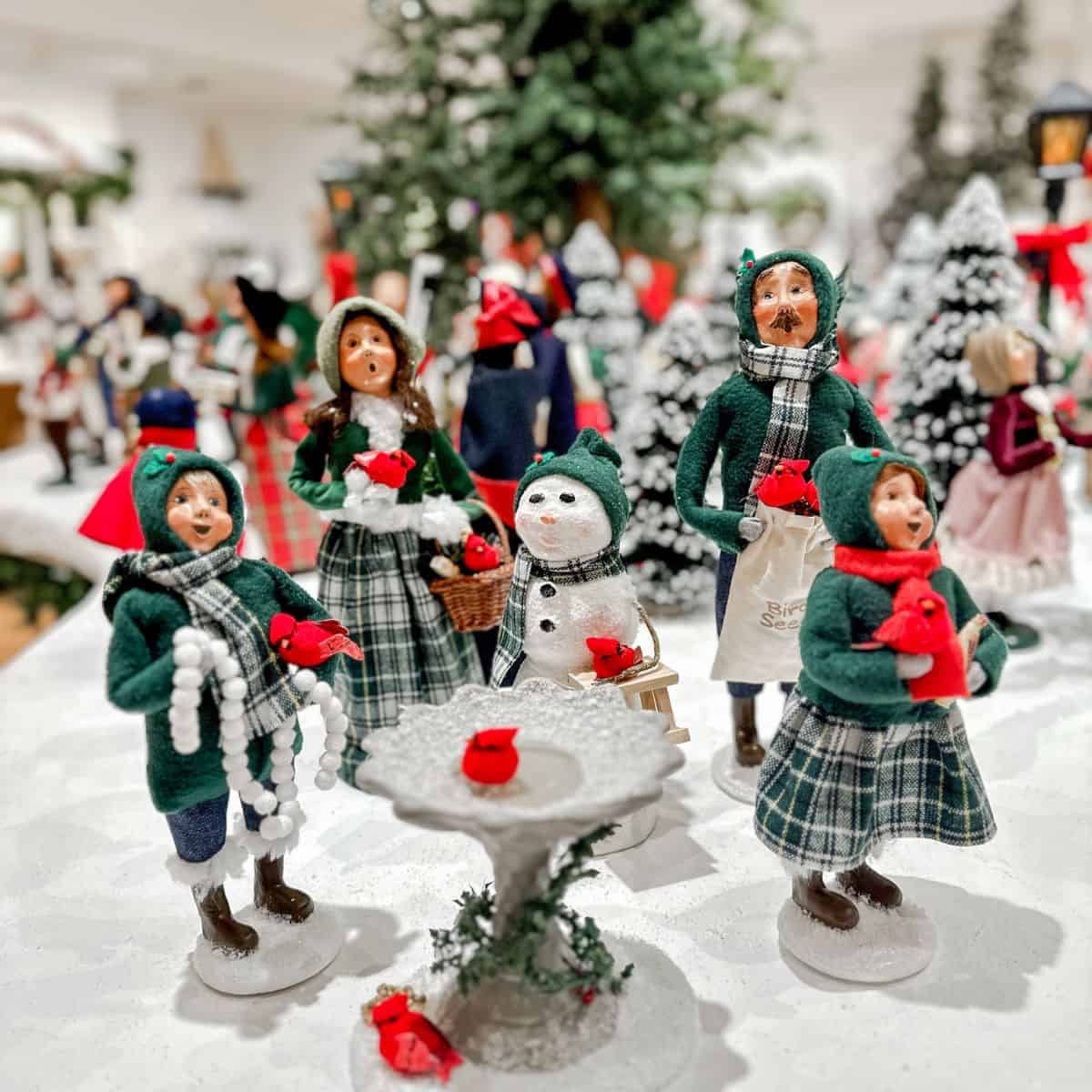 collection of byers choice carolers in their gift shop.