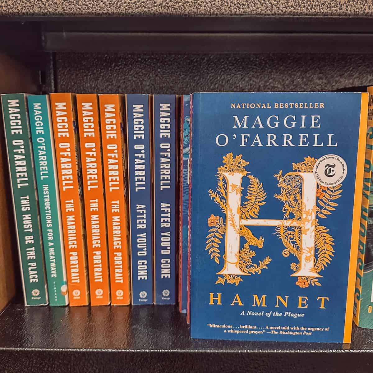 Hamnet by Maggie O'Farrell and other Maggie O'Farrell books on a bookshelf.