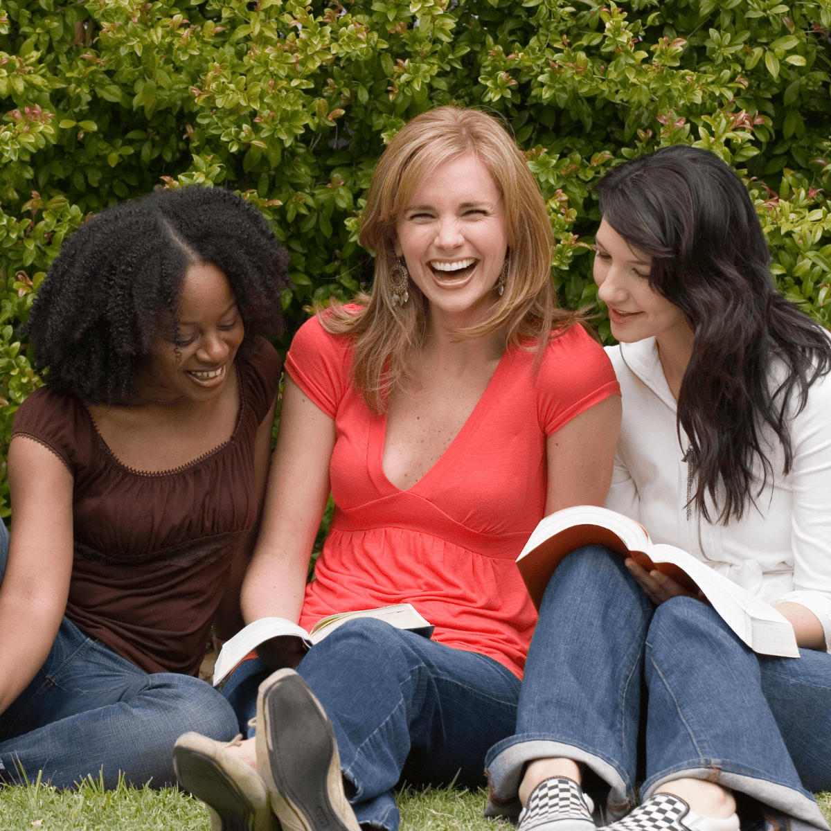 women holding a book club meeting.