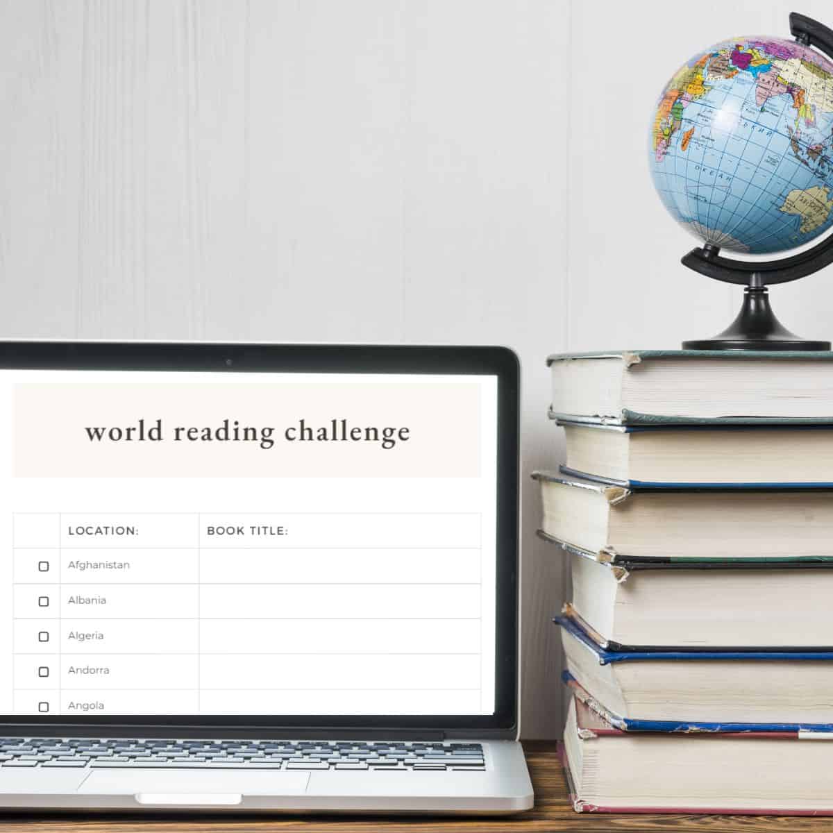 world reading challenge on computer with a globe and stack of books.