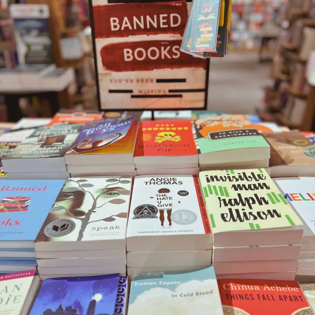 Banned books on a table in a bookstore.