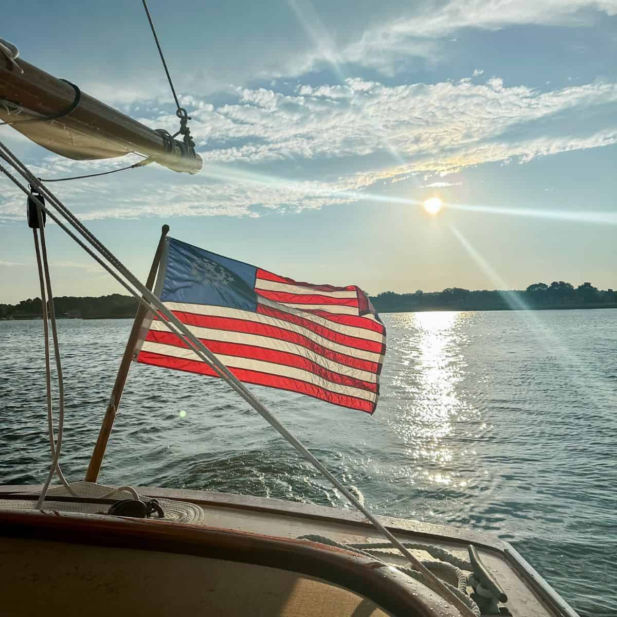 american flag on the sail selina II in st. michaels, md.