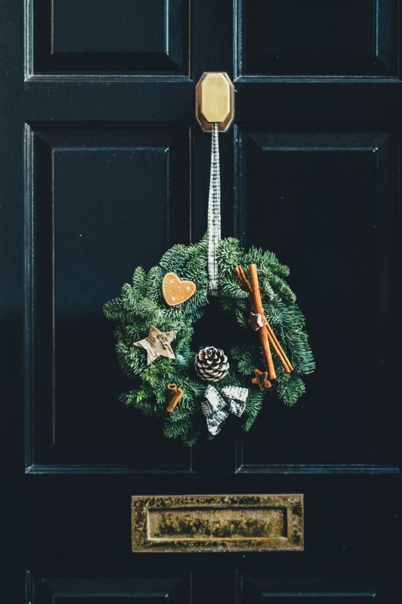 Old fashioned Christmas wreath with dried fruit and cinnamon.